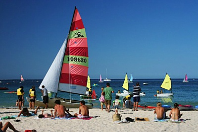 Belle Ile en Mer agency Allain red sailboat on the beach